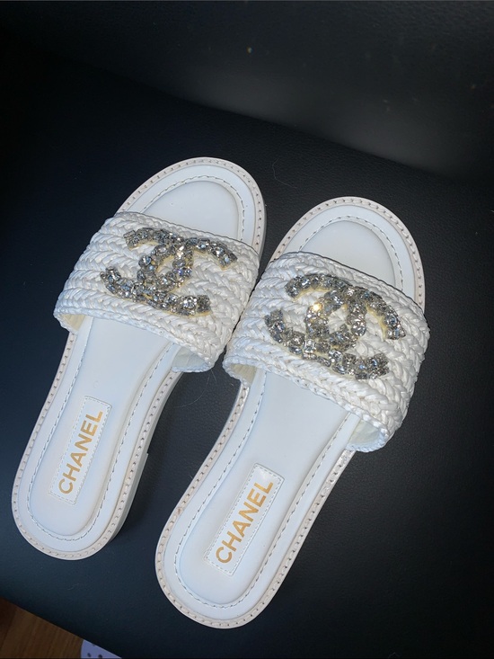 CHANEL Shoes - CHANEL White Braided Slide Sandals with Crystal CC